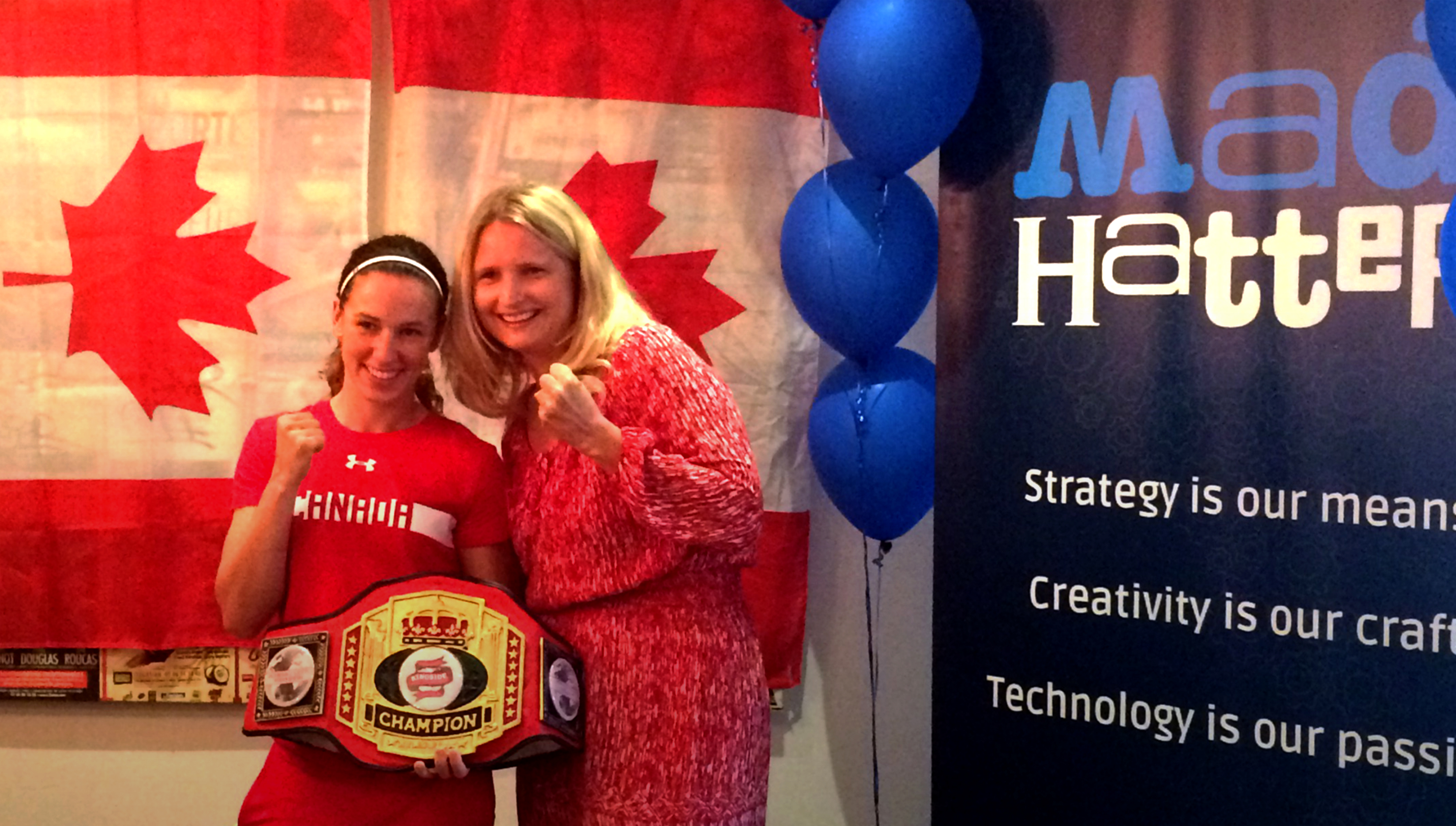 Boxer Mandy Bujold and Melanie Witzell, Agency Director, Mad Hatter Technology at a send off for Mandy at the Mad Hatter Technology office. 